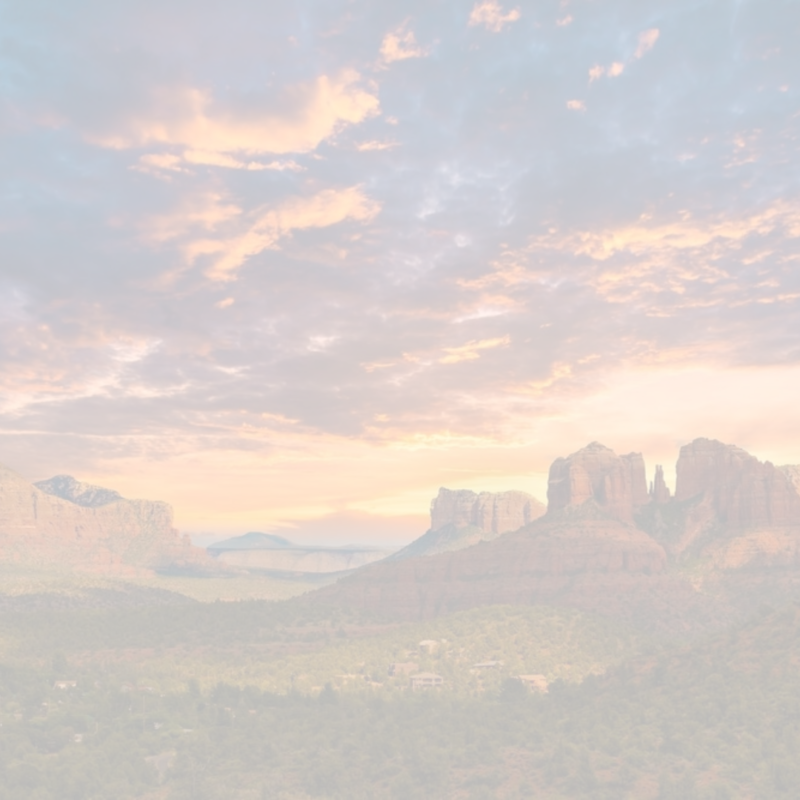 Participants journaling amidst the breathtaking backdrop of Sedona's red rock landscapes during the Soulwrite Retreat with Melissa J Creative.